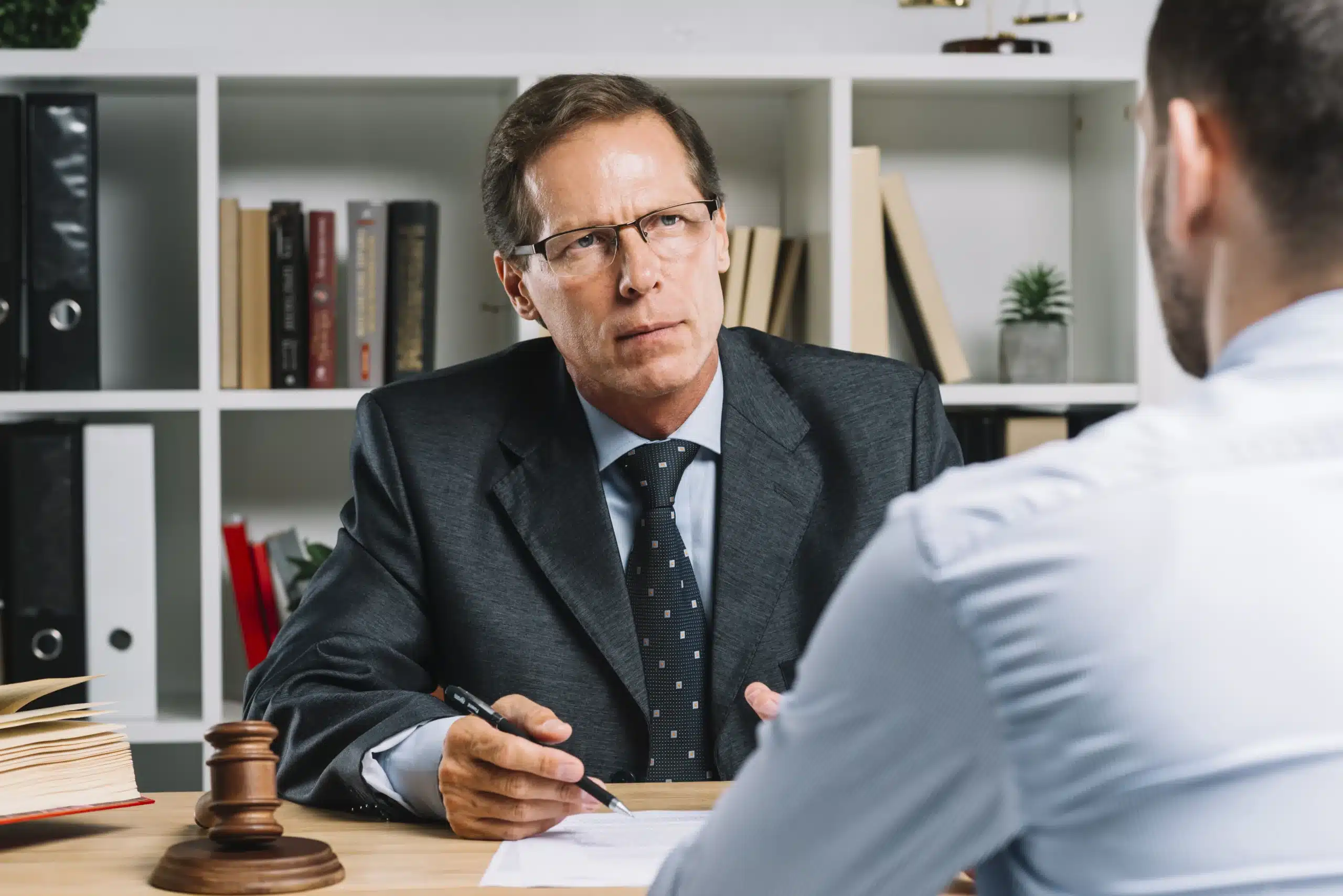 Criminal defense lawyer consulting a client in St. George Utah during a legal case discussion