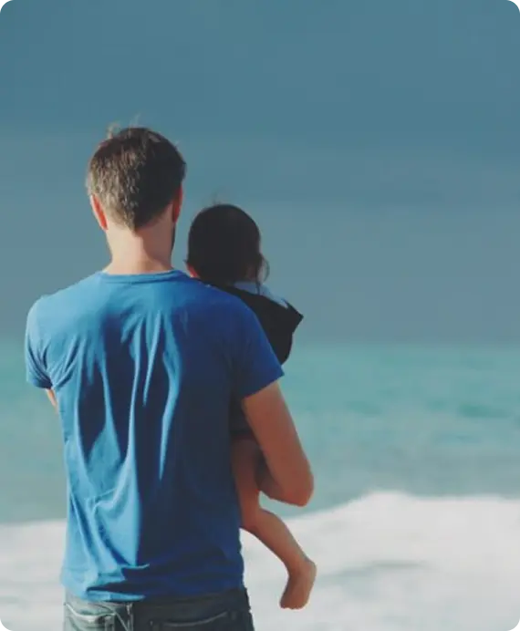 Parent with child representing child wellbeing and family law support at Palmer Litigation